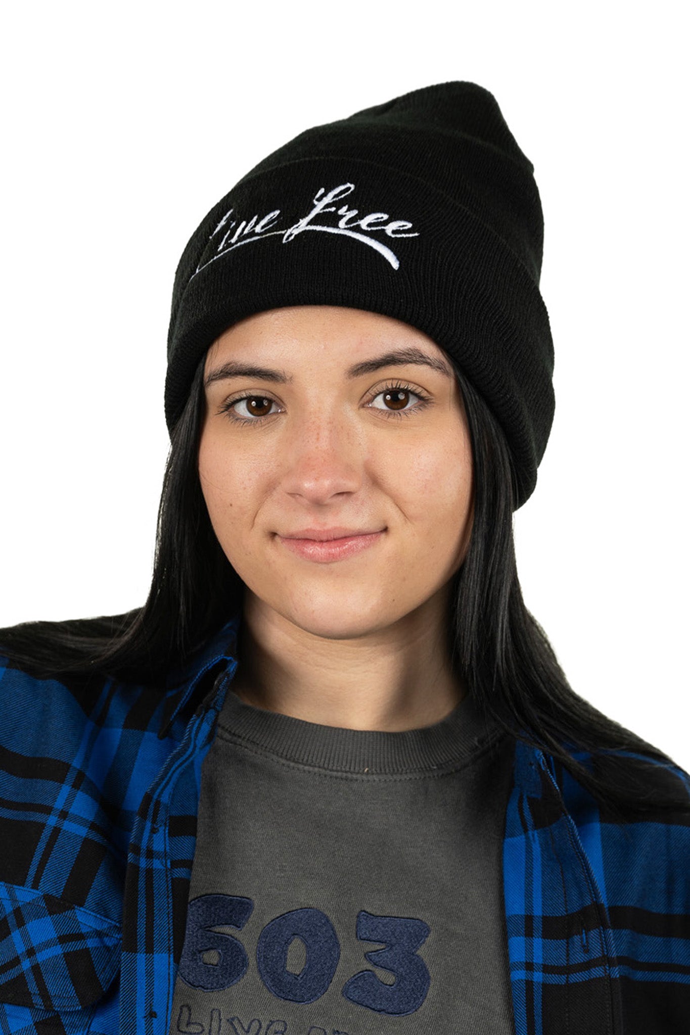 Model wearing black Classic cuff beanie Live Free featuring a simple and timeless design