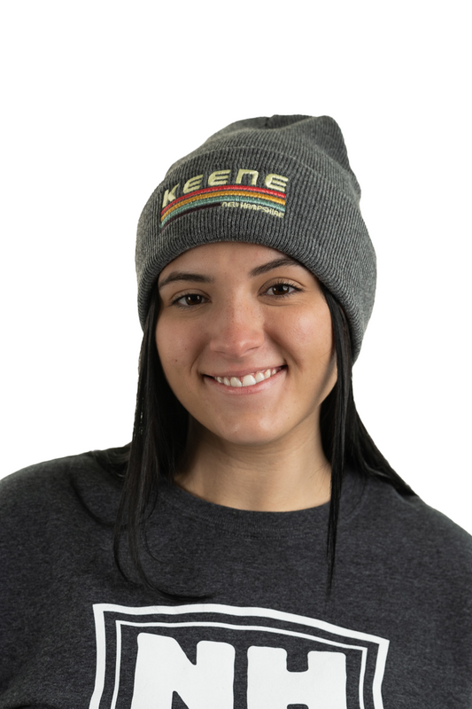 Young woman wearing soft gray Keene NH cuff beanie designed for chilly hikes and cold weather