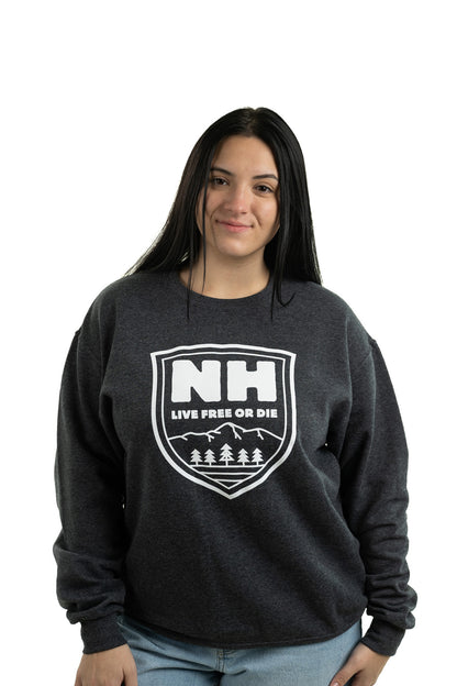 Model in dark gray New Hampshire graphic sweatshirt with oversized and relaxed unisex fit